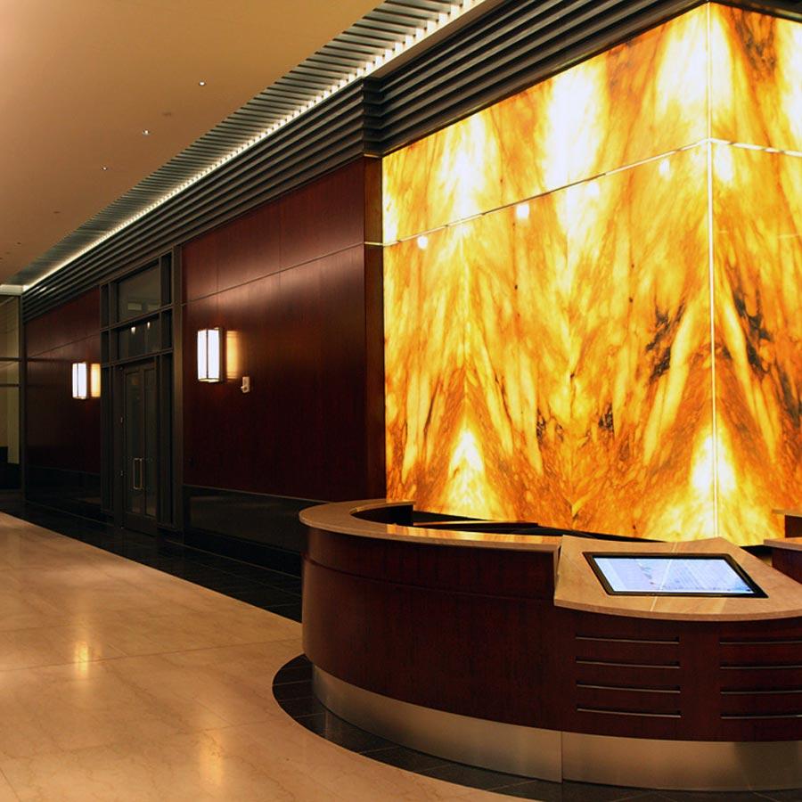 backlit-onyx-columns-reception-desk-wells-fargo-featured-image